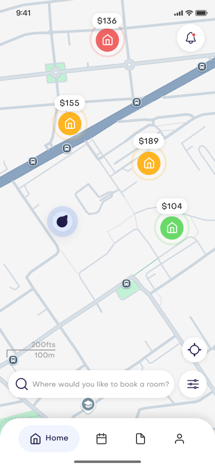 Écran iPhone affichant une carte avec marqueurs colorés autour d'une position.